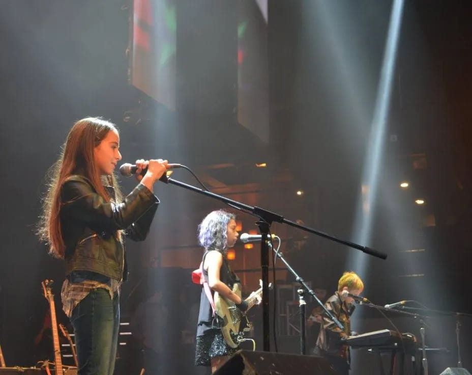 a group of people on a stage