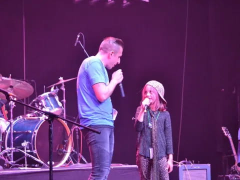 a man and woman on a stage