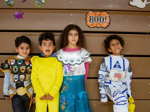 a group of children in clothing