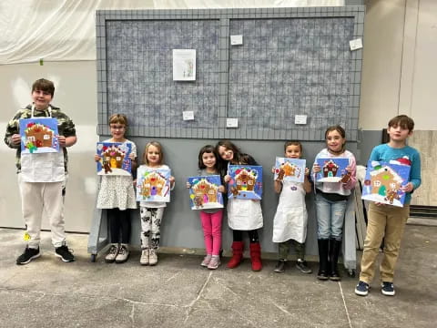 a group of children holding signs