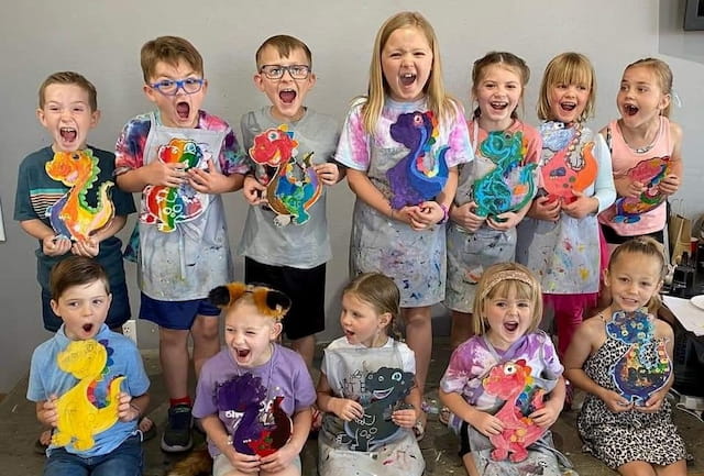 a group of children posing for a photo