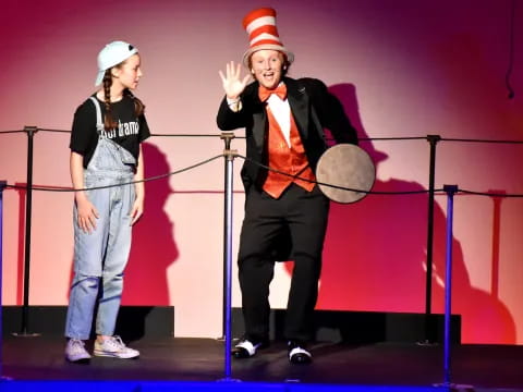 a man and a woman on a stage