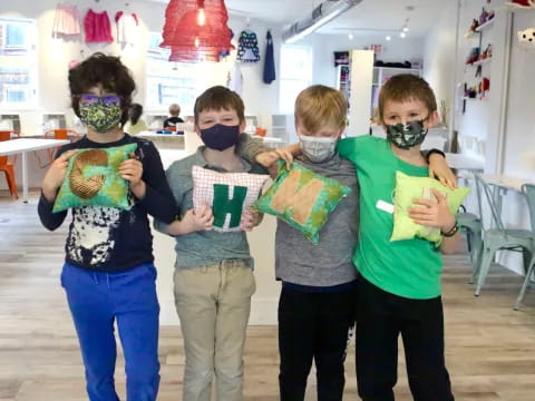 a group of kids wearing masks