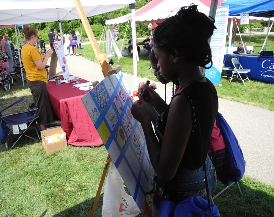 a person painting outside