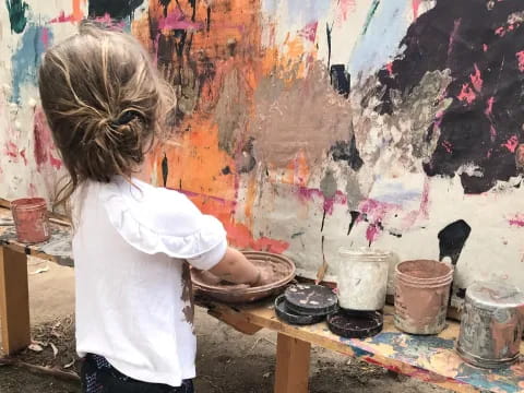 a person painting a wall