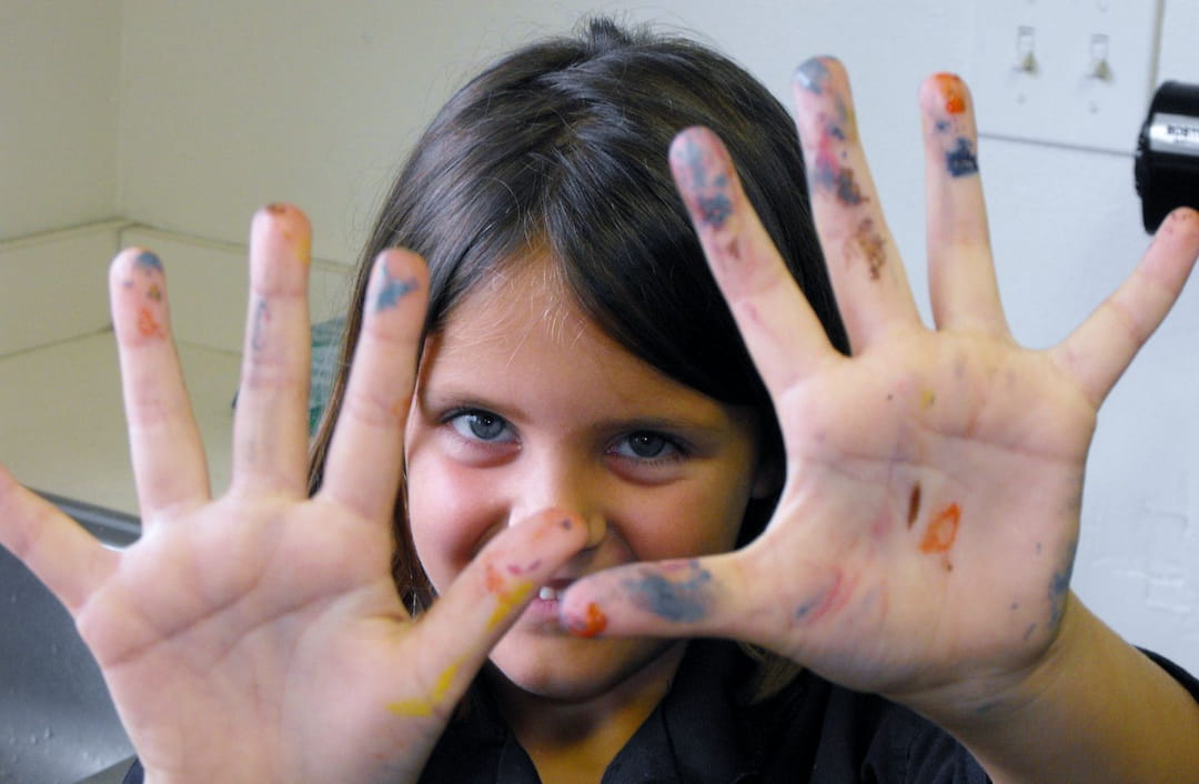 a person with their hands up
