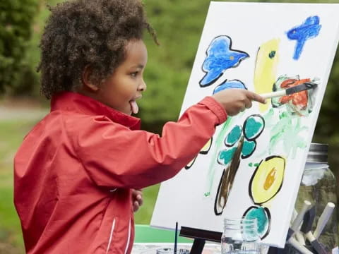 a child painting a picture