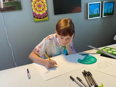 a child sitting at a table