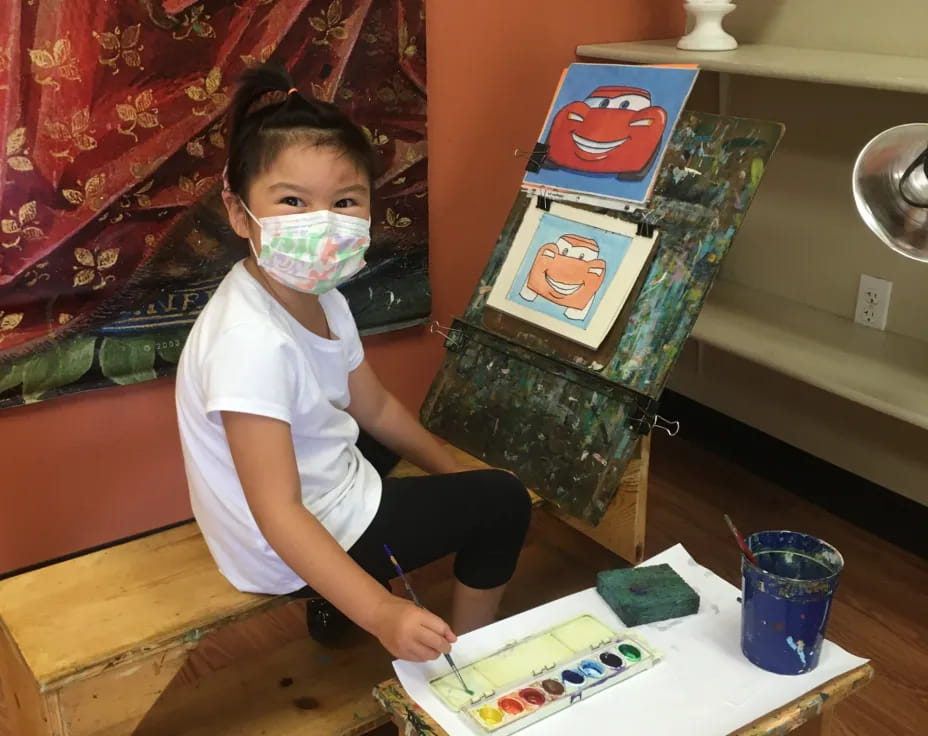 a child with a mask