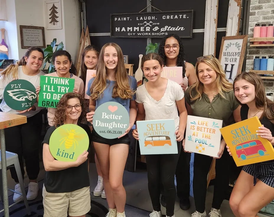 a group of people holding signs