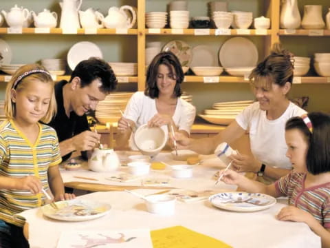 a group of people preparing food