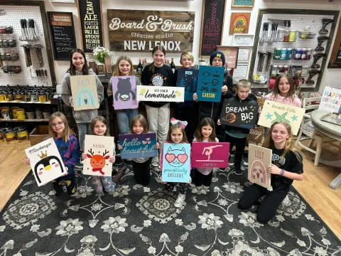 a group of people holding signs