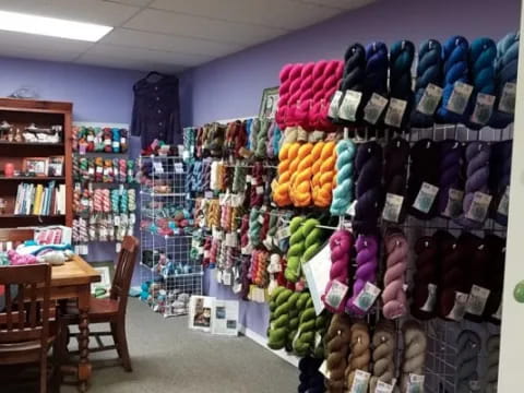 a room with shelves of clothing