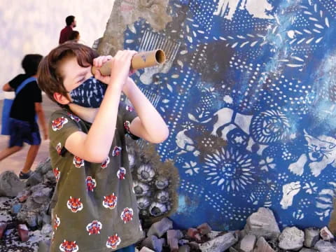 a person painting a wall