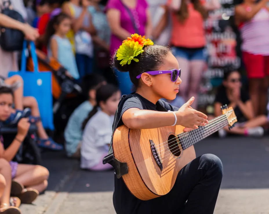 a person playing a guitar