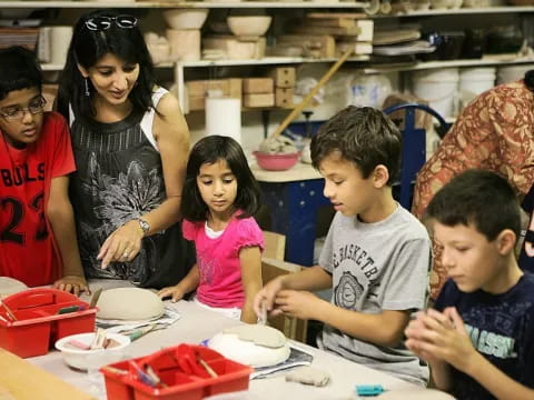 a group of people in a kitchen