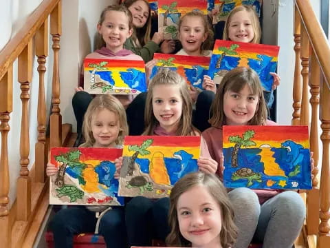 a group of children holding books