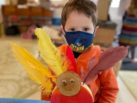 a boy wearing a garment