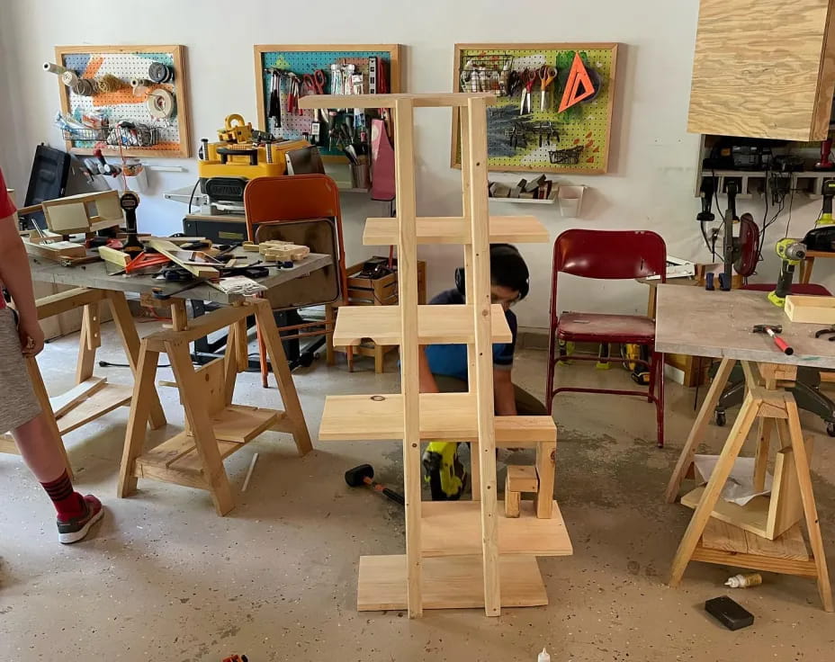 a person painting in a room