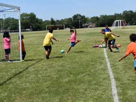 kids playing football on a field