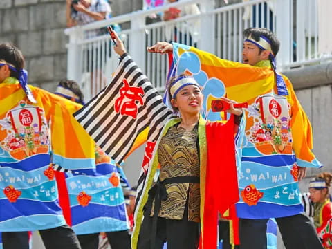 a group of people holding flags