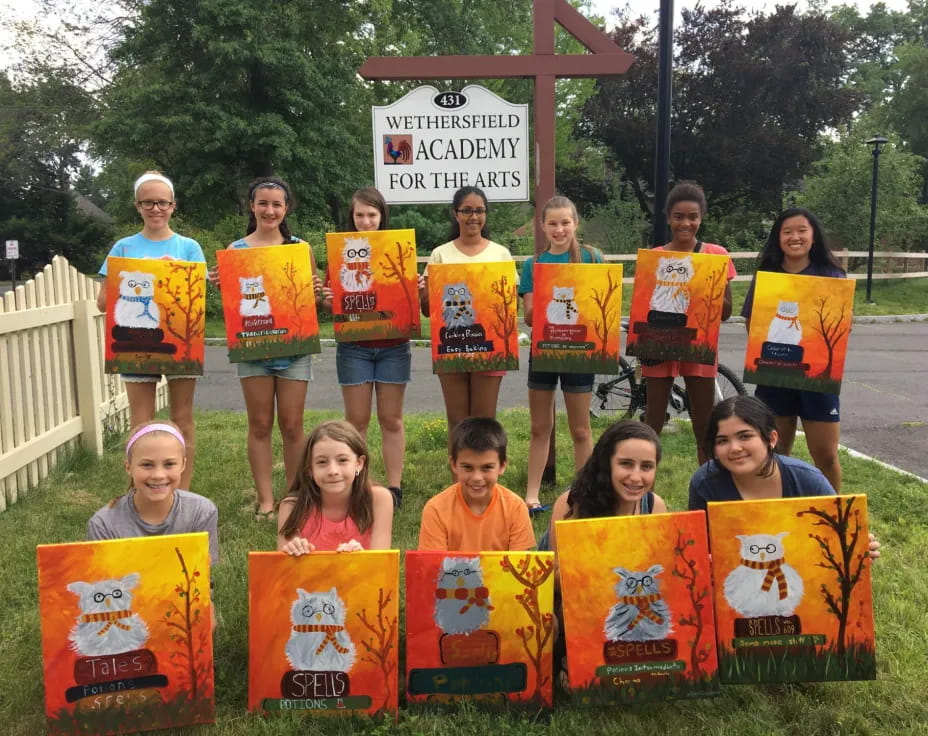 a group of children holding signs