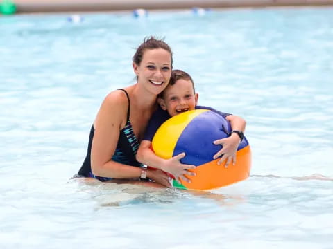 a woman and a child in the water
