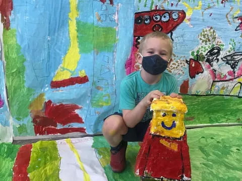 a child sitting on a toy