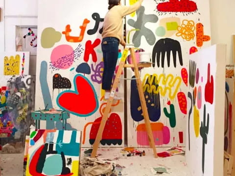 a person painting a wall