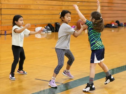 a group of girls in a gym