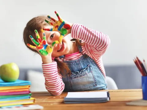 a child holding a toy