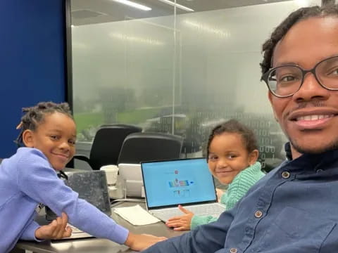 a man and a couple of boys
