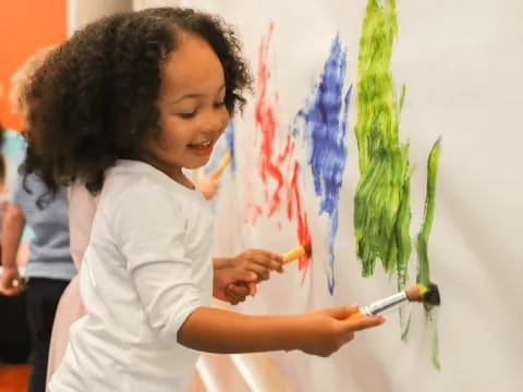 a man painting a picture