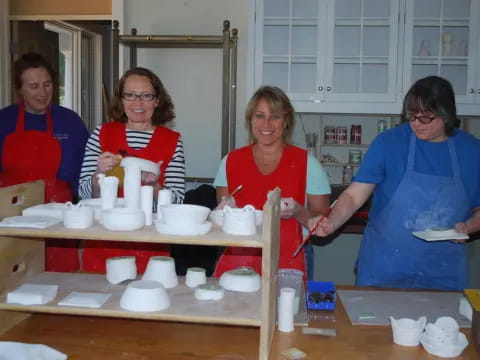a group of women in a kitchen