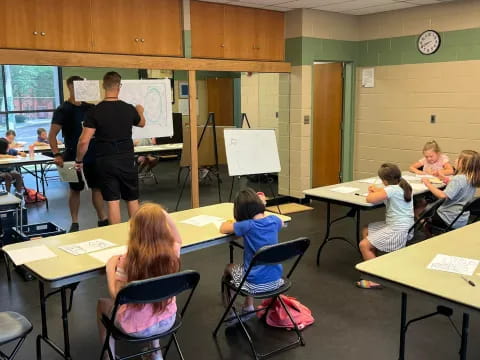 a group of people in a classroom