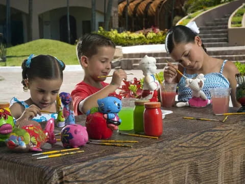 a group of kids playing with toys