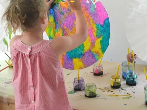 a young girl painting