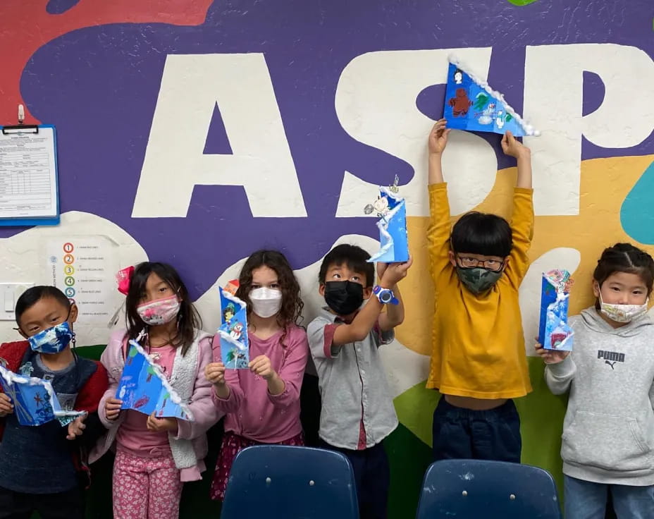 a group of children wearing masks