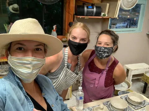 a group of people wearing masks