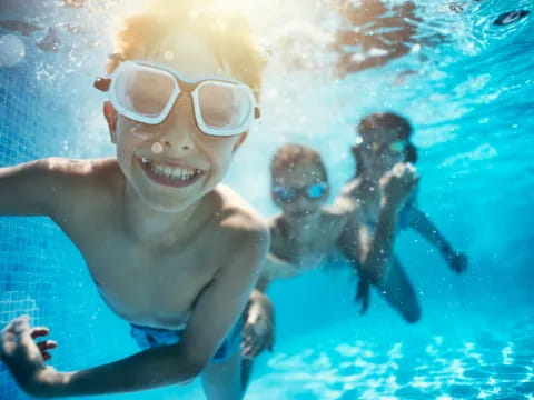 a group of people swimming