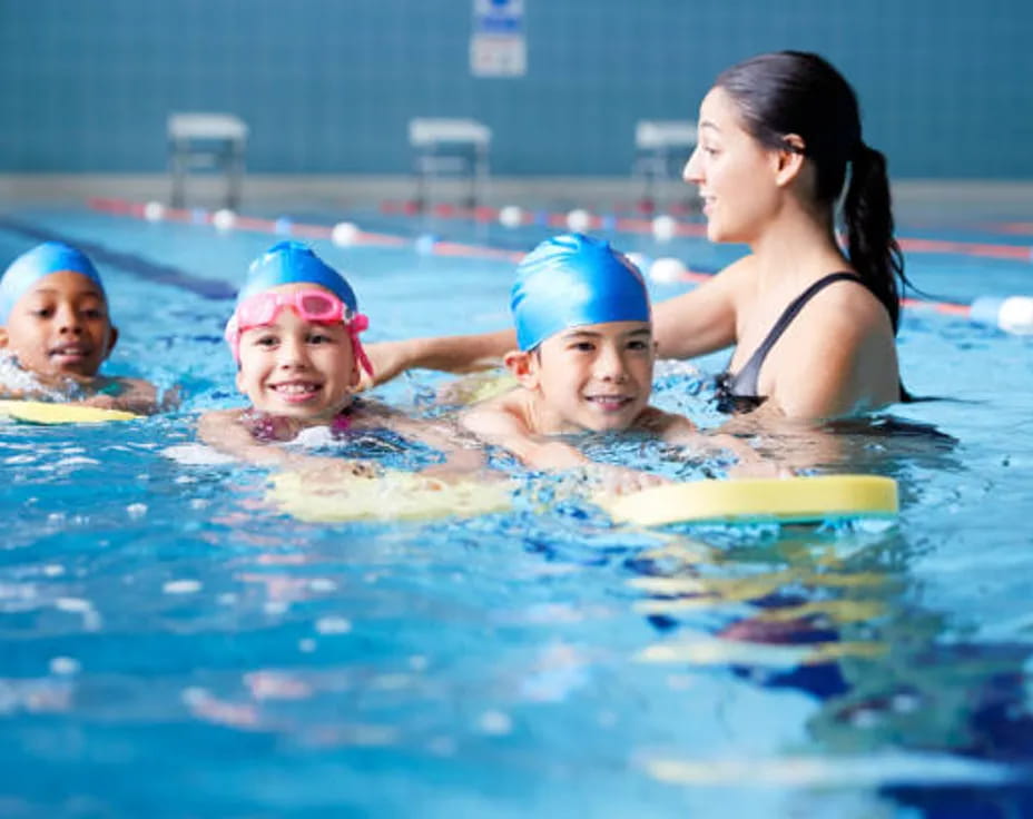 a group of people in a pool