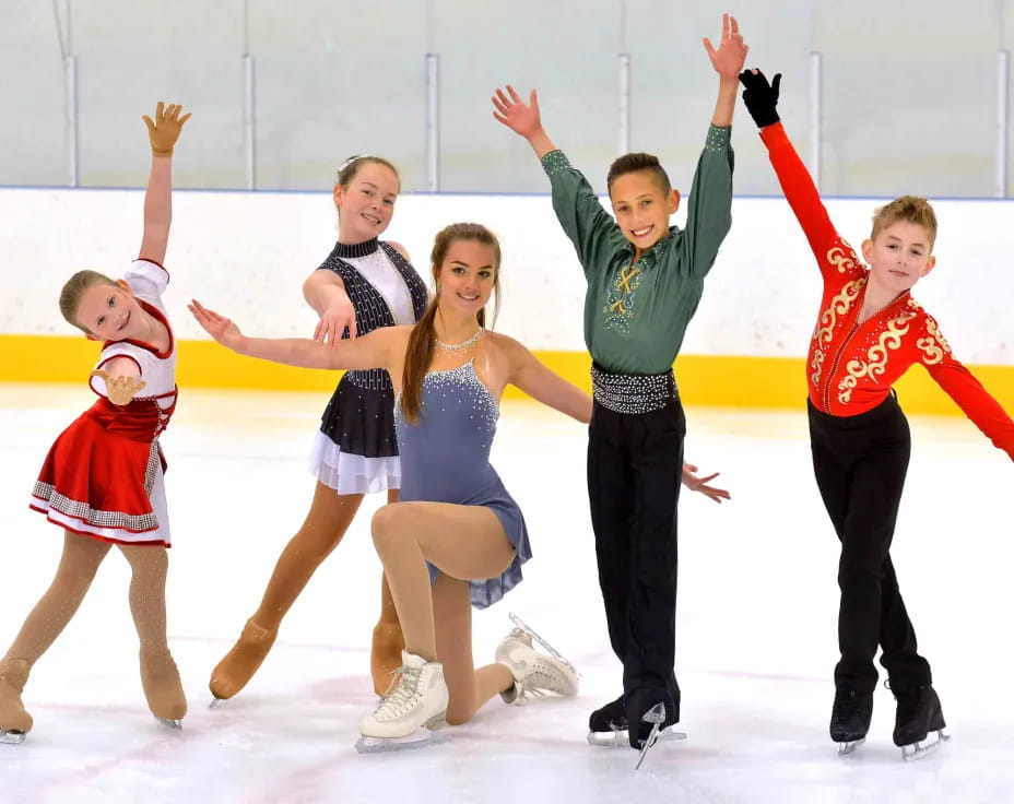 a group of people ice skating