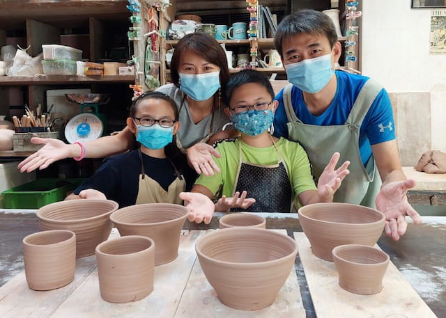 a group of people wearing masks