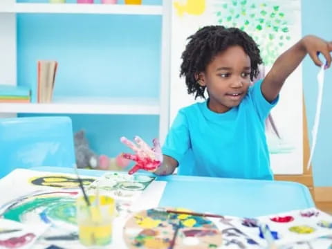 a young girl painting