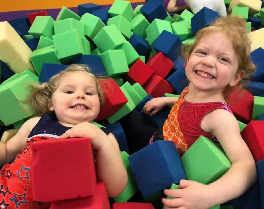 a couple of children in a ride