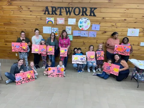 a group of people holding signs