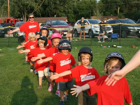 a group of kids wearing helmets