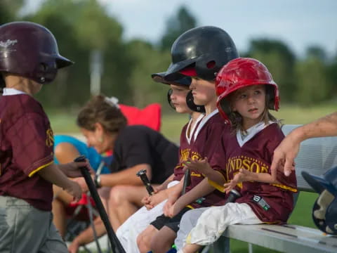 a group of kids wearing helmets