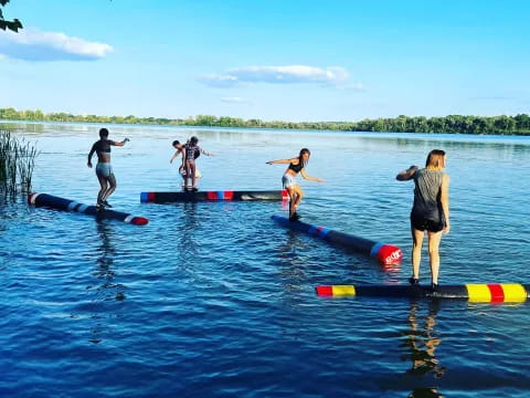 a group of people on a lake