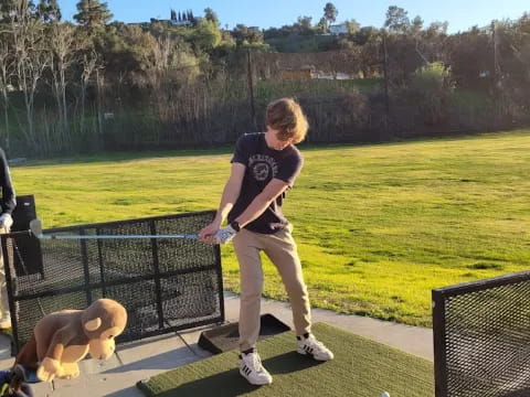 a person and a dog on a deck